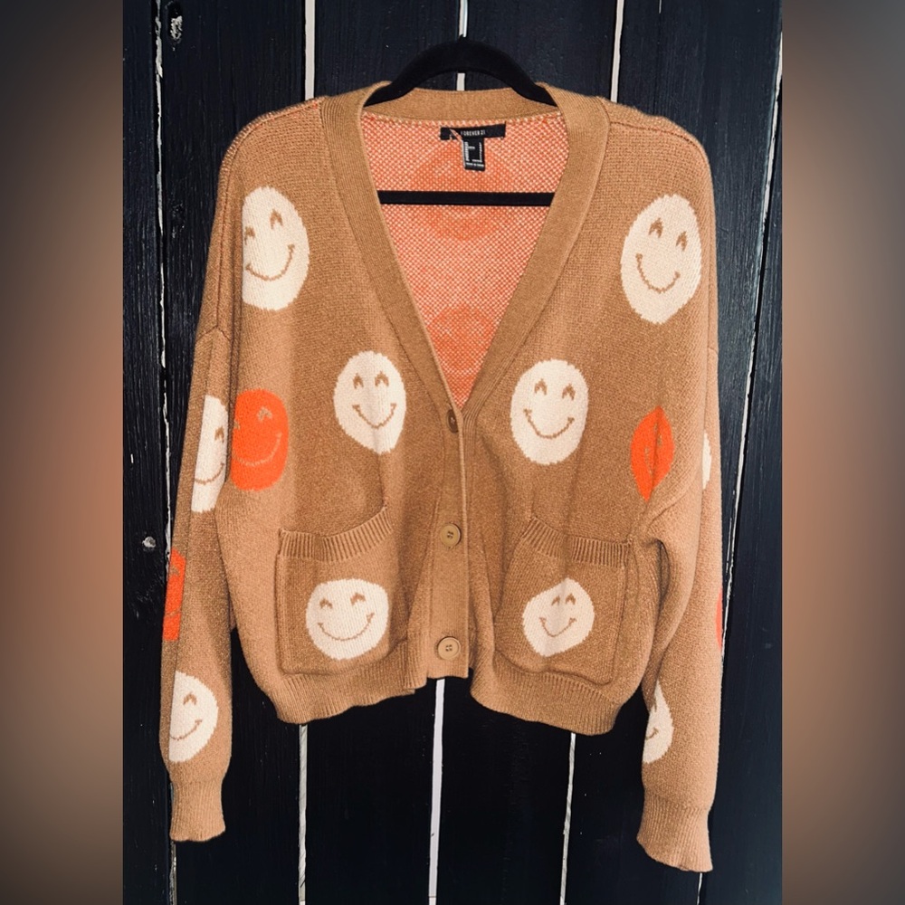 😊Forever 21 smiley face cardigan in a‎ brown/orange and white smiley faces. - Picture 2 of 6